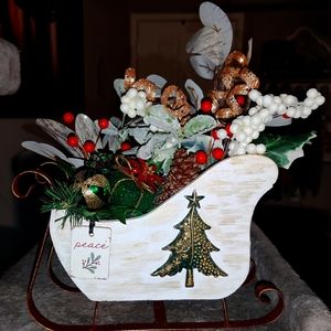 Hand painted sled and flower arrangement